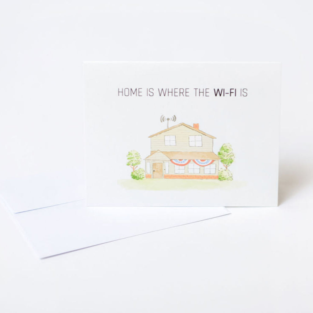 Greeting card with house illustration and text 'Home is where the Wi-Fi is' on a white background