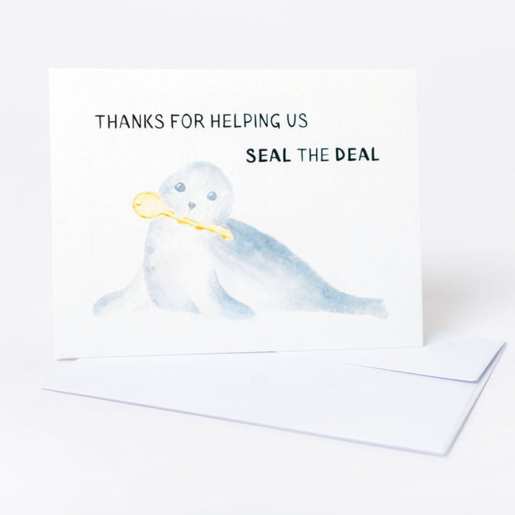 Greeting card with a seal illustration and text on a white background