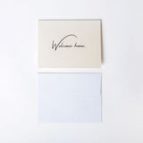 Greeting card with 'Welcome home' printed on 18pt. premium pearl paper with a white A2 envelope