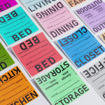 color coded moving box labels against a white background