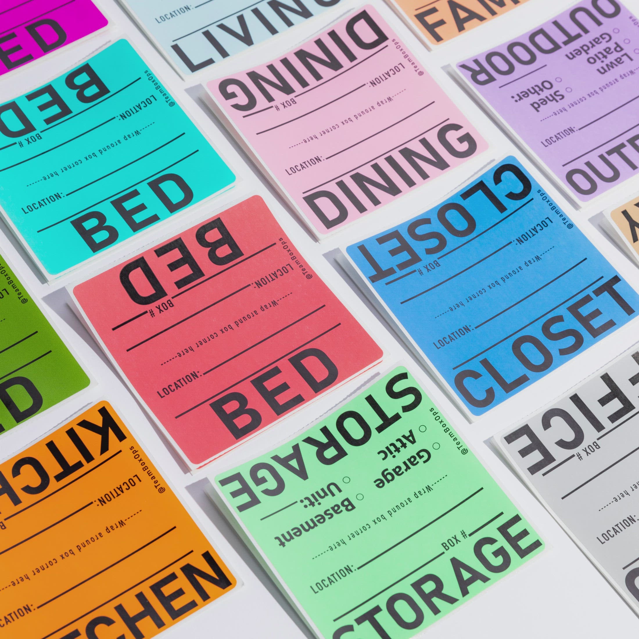 color coded moving box labels against a white background
