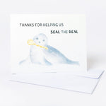 Greeting card with a seal illustration and text on a white background