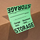 Green storage label on a cardboard box for garages, basements, attics